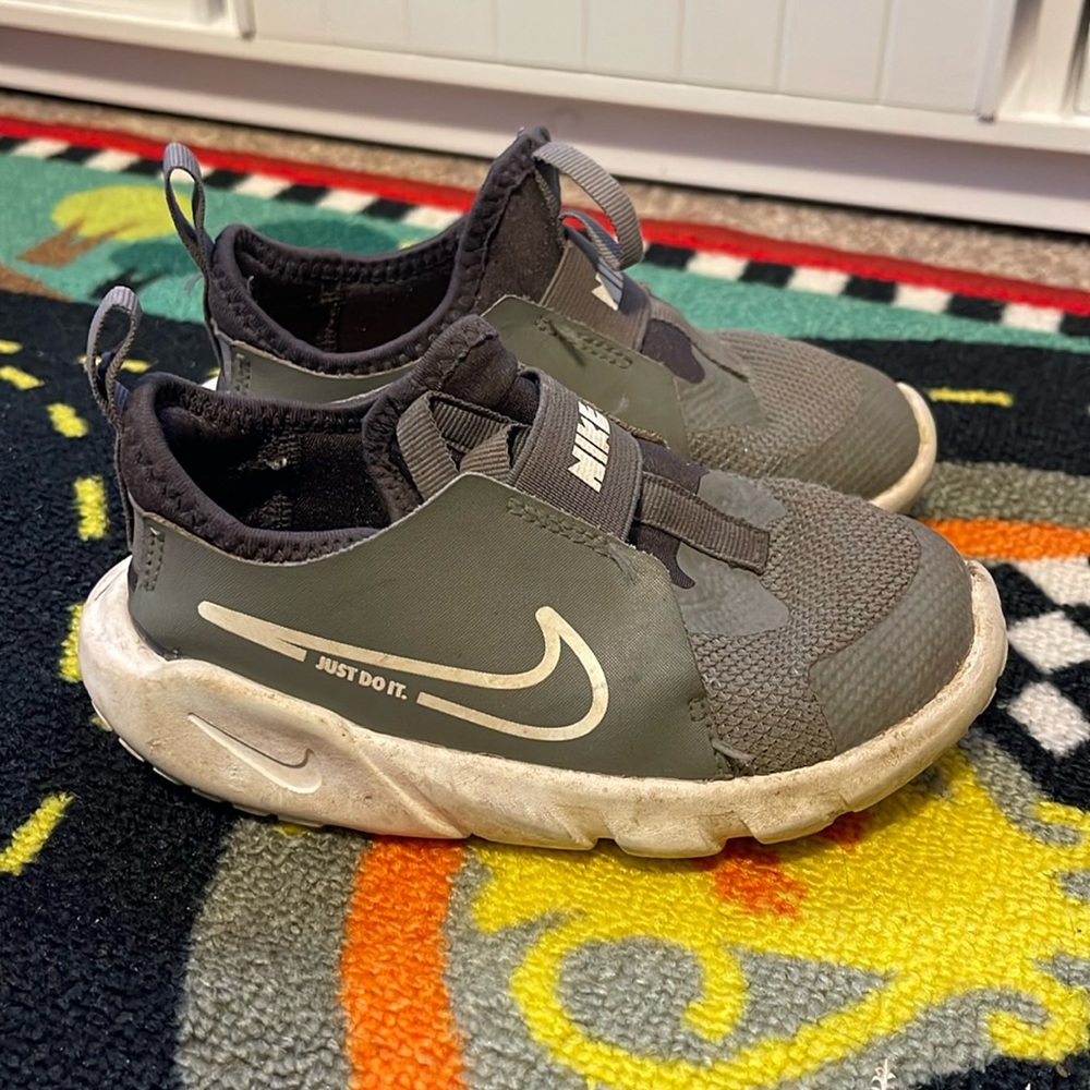 Toddler boys Nike tennis shoes.